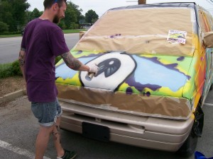 Joen Pallesan painting one of Prestons' delivery vans_Spray Day 2013