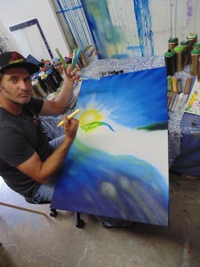 Drew Brophy painting Nelscott painting with  Montana Cans paint pens